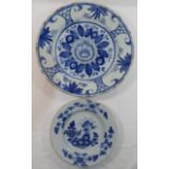 A large Delft plate, 35.5cm diameter, and a smaller Delft plate, 23.