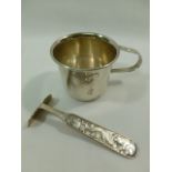 A David Anderson Norwegian .830 silver babies pusher, the handle cast with a hare, fox and bear, 0.