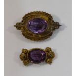 A Victorian gold and amethyst brooch, with wire decoration, the oval amethyst 1.9cm x 1.