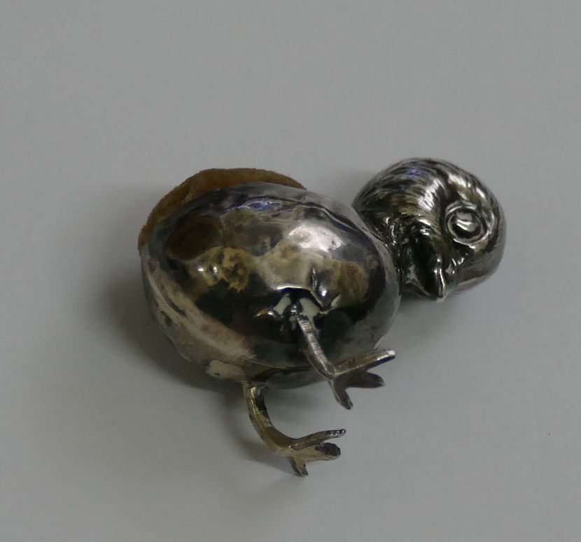 A miniature silver pin cushion in the form of a chick in an egg, Birmingham 1910, - Image 2 of 6