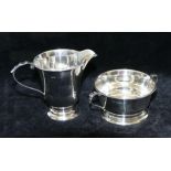 A silver cream jug and matching sugar bowl, Birmingham 1972, combined weight 4.02ozt, 125g, jug 7.