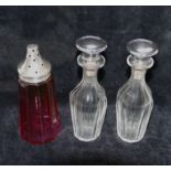 A pair of Continental silver mounted cut glass oil and vinegar bottles with facet cut decoration,