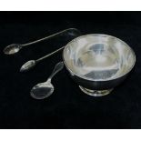 An Edwardian silver bowl, Sheffield 1913, a silver caddy spoon, Birmingham 1930,