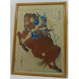 A Japanese woodblock print of a horse and rider carrying a samurai sword, 35cm x 24.