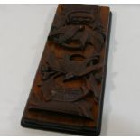 A burr walnut and mahogany bookslide, the pierced and carved ends in the form of a bird and nest,