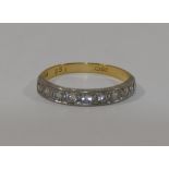 An 18 carat gold diamond half eternity ring,