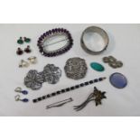 A quantity of silver jewellery, comprised of a blue and white paste set bracelet,