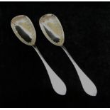 A pair of Victorian silver serving spoon