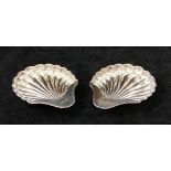 A pair of Edwardian silver butter shells