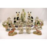 A collection of 19th century and later Staffordshire figures, comprised of two pairs of cats,