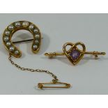 A Victorian gold half pearl set horseshoe brooch, 24mm x 23mm, 4.