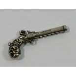 An S Mordan and Co silver propelling toothpick in the form of a pistol marked 'July 6 1840' and