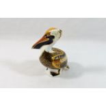 A Royal Crown Derby Brown Pelican paperweight, with gold stopper,