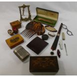 A collection of miscellaneous items comprised of a Bakelite cigarette case, gold plated Cross pens,