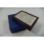 A small silver mounted leather bound birthday book with decorative silver panel to the front,