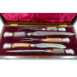 A five-piece antler handled carving set, with silver mounts, Sheffield 1905 by Walker and Hall,