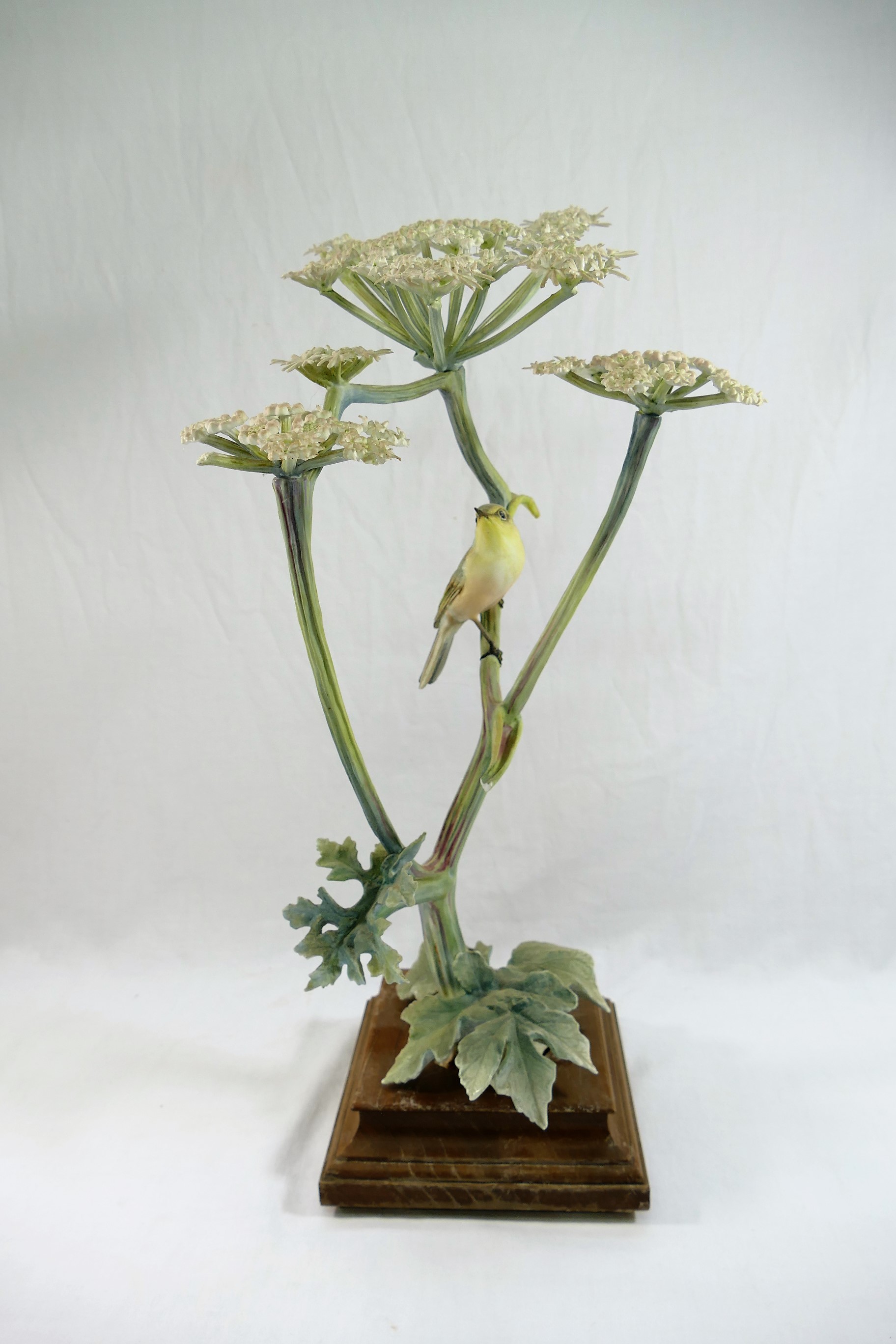 A Royal Worcester figure, 'Chiff Chaff Phylloscopus Rufus and Hogweed', with wooden stand,