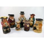 Four Royal Doulton charactar jugs comprised of 'The Huntsman', 18cm high, 'Winston Churchill', 22.