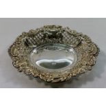 An oval silver bon bon dish with pierced and embossed decoration, Birmingham 1979, 15.5cm long, 2.