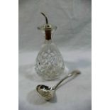 A silver mounted cut glass bitters pourer with silver spout, Birmingham 1956, 13.