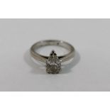 An 18 carat white gold diamond single stone ring,