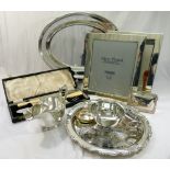 A large quantity of 20th century silver plated items including photograph frames, an oval tray,