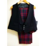 A pair of MacDonald tartan trews with black coatee and waistcoat,