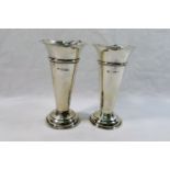 A pair of Edwardian silver vases, London 1903 by The Goldsmiths and Silversmiths Co.