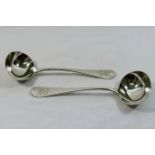 A pair of Victorian old English pattern silver sauce ladles, London 1782, by George Adams, 17.