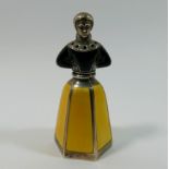 A Norwegian silver and enamel pepperette in the form of a woman by J Tostrup of Oslo,