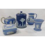 A collection of four Wedgwood blue jasperware items comprised of a tabacco jar, 15.