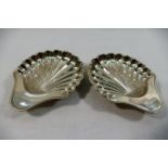 A pair of Edwardian silver butter shells, Sheffield 1906, 10cm long, combined weight 2.02ozt, 62.