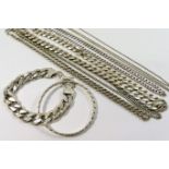 A collection of five silver and silver coloured metal chains and a bangle and a bracelet,