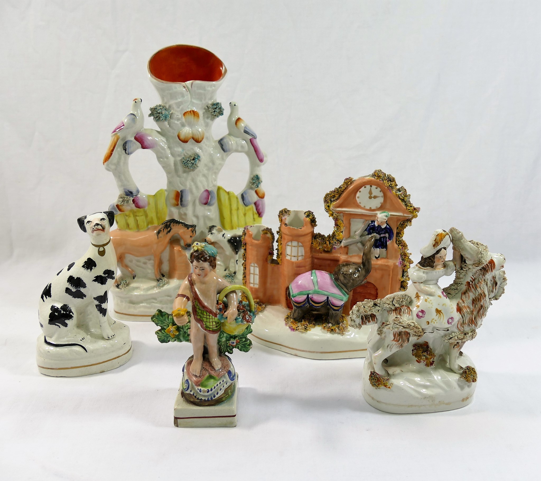 Five pieces of Staffordshire pottery comprised of a figural group of Prince Almansor and the