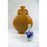 A 19th century Japanese blue and white sake flask, 21.