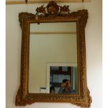 A large 19th Century gilt gesso framed wall mirror, with cornucopia,