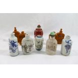 A collection of ten Chinese snuff bottles comprised of three porcelain examples,