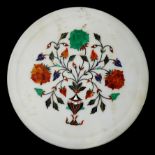 An Indian circular alabaster pietra dura plate, decorated with flowers,