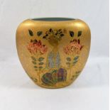 A Rosenthal porcelain vase by Bjorn Wiinblad, with mottled gilt ground and lustre enamel,