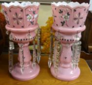 Pair of Victorian pink glass table lustres with enamel decoration, height 33cm.