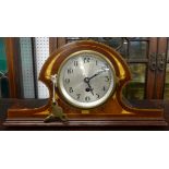 A French mantle clock with mahogany chequered cross banded and inlaid case.