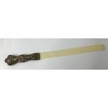 A antique silver mounted and ivory paper knife 36cm long.