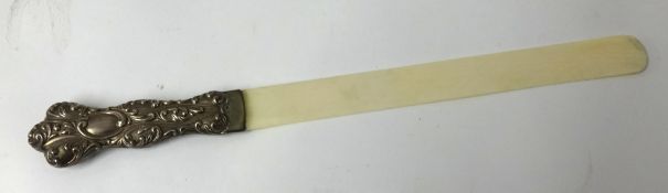 A antique silver mounted and ivory paper knife 36cm long.
