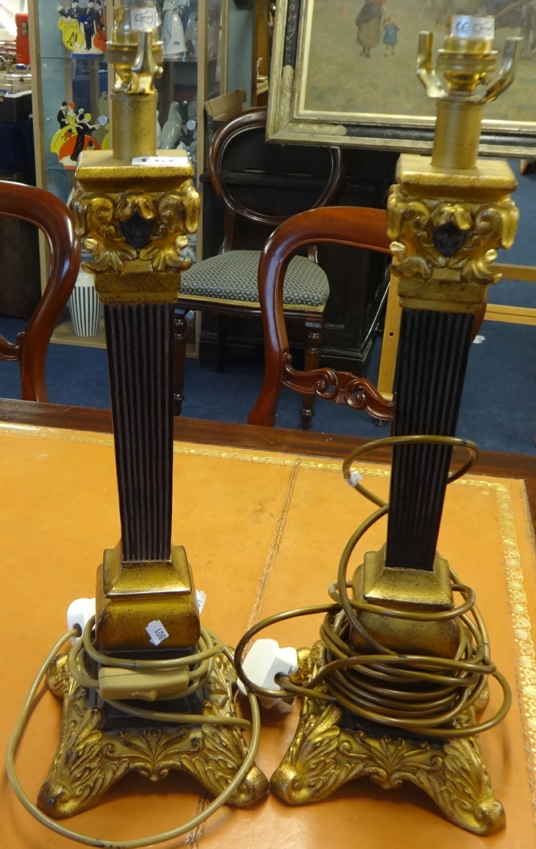 A pair of modern table lamps and another larger ornate table lamp (3).