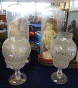 Two Victorian glass domes 72cm, a pair of figures, and pair of large glass two part table lamps,