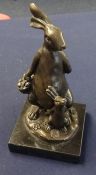 Modern bronzed model of a hare and baby signed MILO with Paris foundry mark, height 17cm.