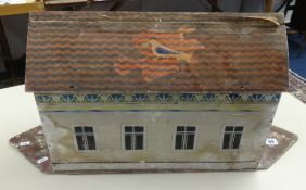 An antique Noah's Ark with collection of carved wood animals, makers/retailers label.