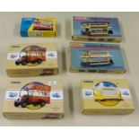 A large collection of boxed diecast models including Corgi buses, GB buses, Exclusive First