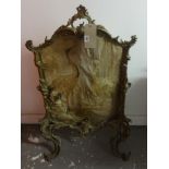 An ornate French style brass fire screen also a 19th Century bamboo fire screen of Chinese design (