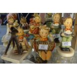 Hummell table lamp base (restored) together with six other Hummell figures.